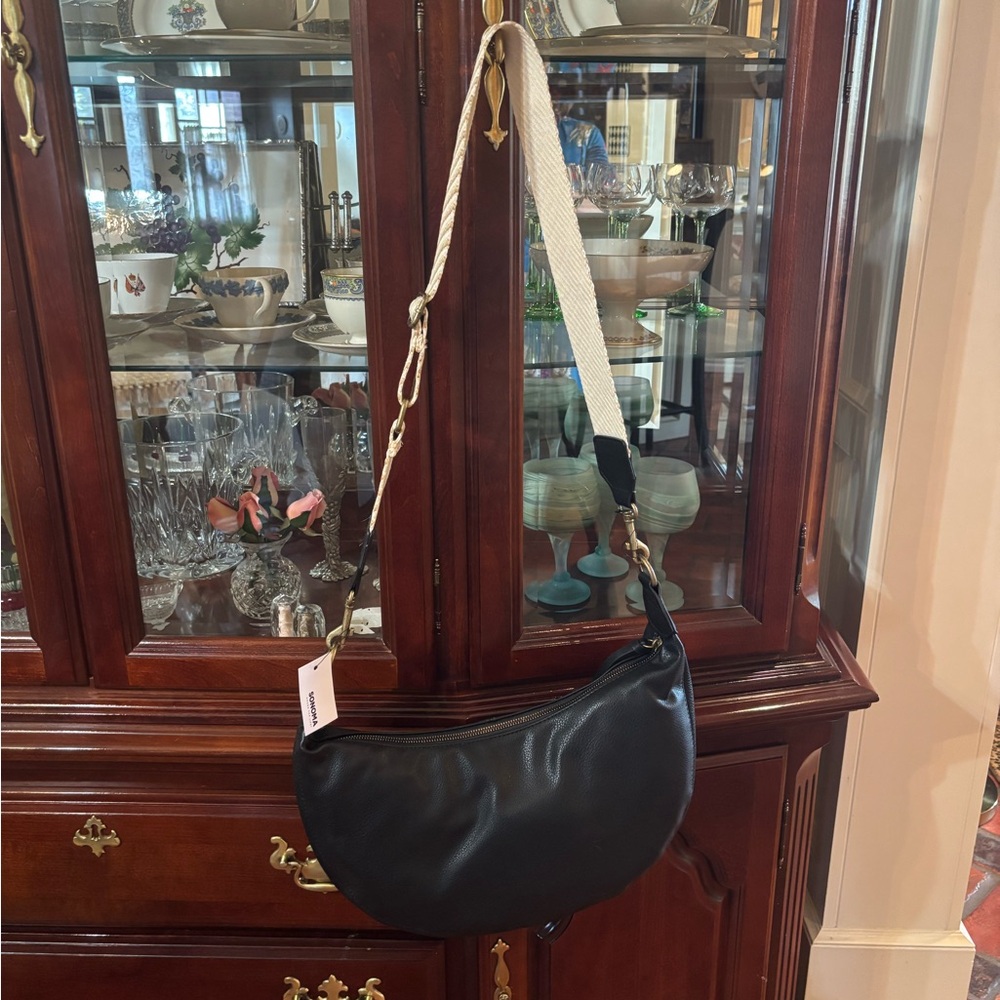 Black Crossbody Bag by Sonoma. 14 in wide by 11 in high. Adjustable strap. NWT